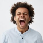 man shouting loud